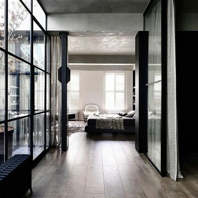 Black steel windows and doors - bedroom feature