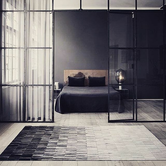 Minimalist black framed internal room dividers and doors